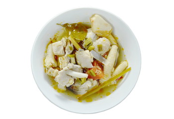 spicy boiled chicken with straw mushroom Tom Yum Soup on bowl