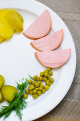 process of preparation of salad by the child at school of young cooks
