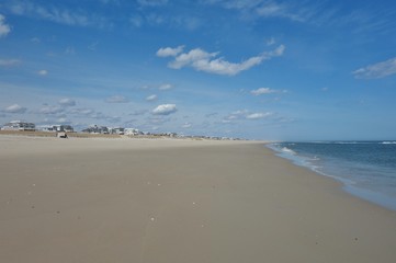 Fototapeta na wymiar The long sand beach in Beach Haven on the Jersey Shore on Long Beach Island, New Jersey 
