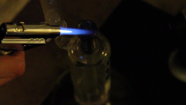 Taking a BHO hash oil marijuana dab.