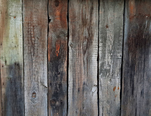 Wood texture. Old shabby painted panels fence background. Old wood planks texture 