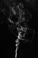 abstract fragment movement of white smoke on black background.