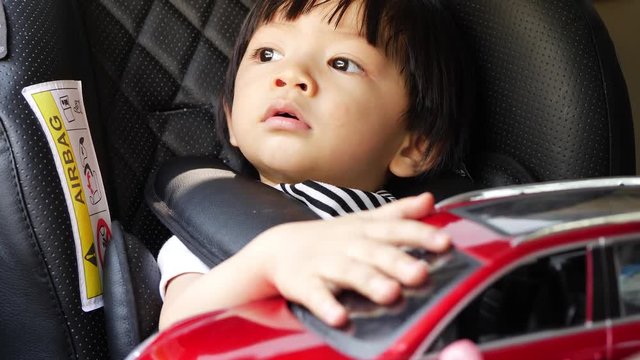 baby sitting in car seat safety