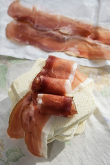 sandwich with filling of speck or Italian smoked ham
