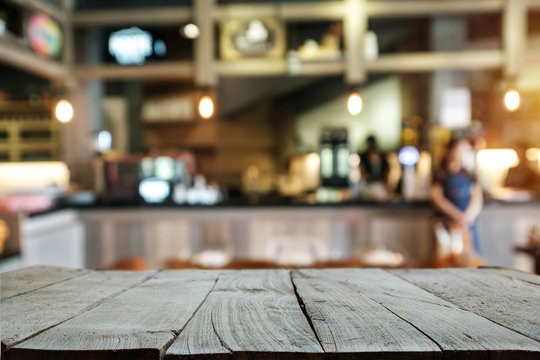 old wooden table space platform and blurred resturant or coffee shop  background for product display montage Stock Photo | Adobe Stock