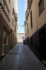 Fototapeta na wymiar The Ancient street of Cadiz, one of the oldest cities in Western Europe.