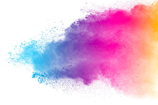 Multi color powder explosion isolated on white background. Color dust splash cloud on white background. Launched colorful particles on background.