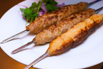 Lula kebab on the skewer. Meat on a skewer
