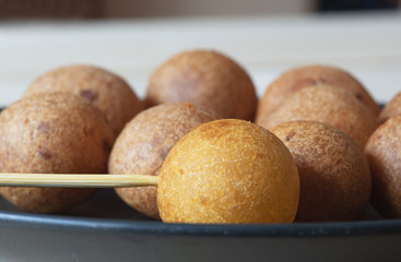 Thai fried sweet potato balls with wood pick