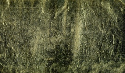 Texture of decorative leather. Dark Golden, brown surface with traces of aging, use, dents, scratches. Grunge pattern