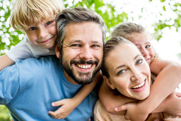 Parents give piggyback ride