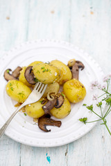 potato with mushrooms on the fork