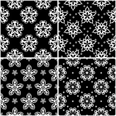 Floral patterns. Set of black and white seamless backgrounds