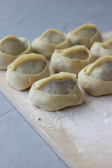 Dumplings of thin dough stuffed