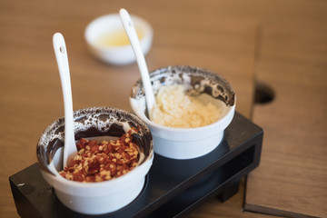 Set of sauce on wood box