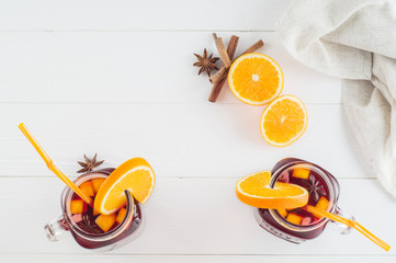 Two fruit tea in vintage glass jars