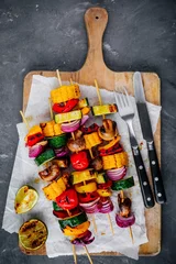 Foto op Canvas Grilled vegetable skewers with sweet corn, paprika, zucchini, onion, tomato and mushroom © nblxer