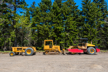 Earth Movers at Road Contruction Site in Forest