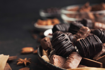 Variety of chocolate candies in old fashioned bowl