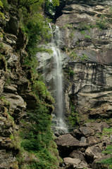 Fototapeta na wymiar Valle Versasca, minor tributary waterfall