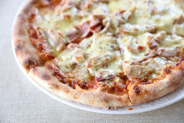 Pizza ham bacon with cheese and tomato sauce