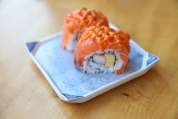Salmon egg on sushi nigiri roll