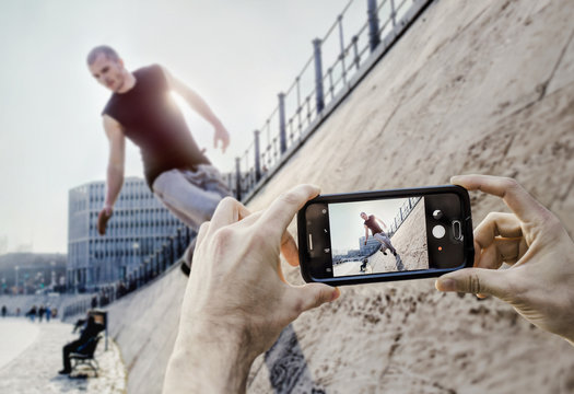 Smartphone photography of a man doing Parkour