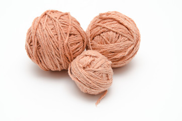 Colorful balls of yarn isolated on white