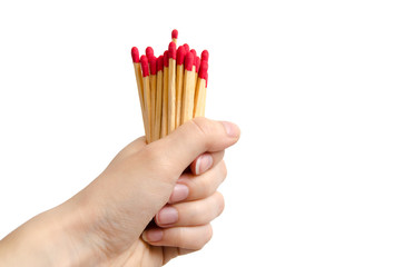 Hand with matches isolated on white background