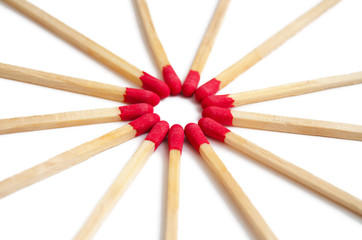 Circle of matches isolated on white
