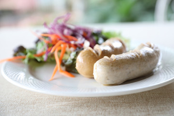 Grilled Pork Sausage on dish in close up