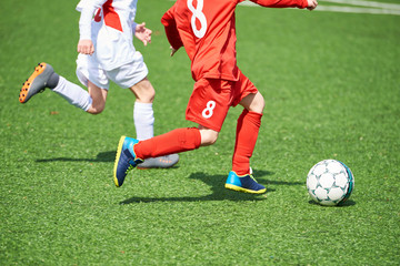 Child football players and ball