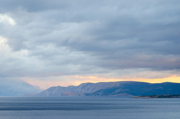 Dark clouds at sunset over a landscape on the coast of Croatia