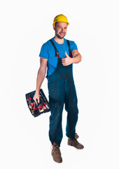Portrait of a handyman holding toolbox