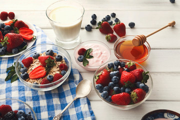 Rich breakfast on white wooden table
