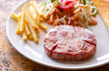 Ham steak and vegetable salad