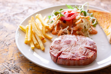 Ham steak and vegetable salad