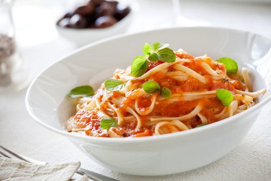 Bowl Of Pasta With Organic Tomato Sauce And Basil