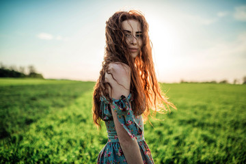 red-haired girl in the field