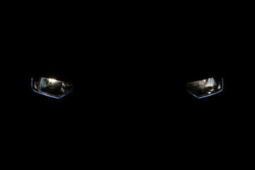 Headlight car in dark background