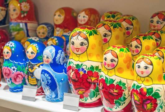 Lot of traditional Nesting dolls or Russian Matryoshka on the store shelves.