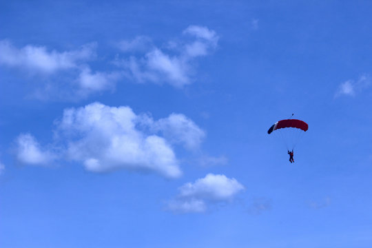 Skydiver In Blue Sky. Active Hobby.Skydiving.Abstract Nature Background.