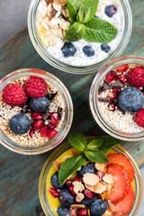 Selection of layered jars with fruits