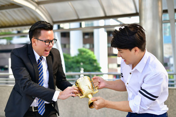 Young businessmen are competing for wins and trophies.