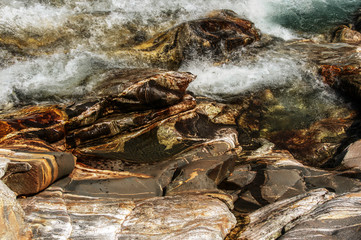 Veins of the Earth; patterned strata in the Versasca river ned, Ticino