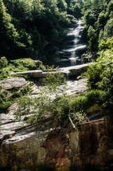 Descent; cascade waterfall on the wall of the Valle Versasca in Ticino