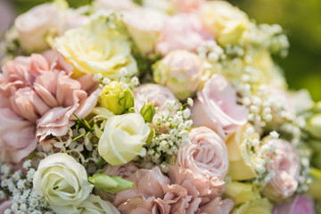 A beautiful wedding bouquet made of roses is a detectable shot that can be used as a background