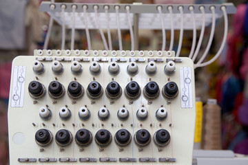 Embroidery machine. Fabric production. Embroidery. Loom.
