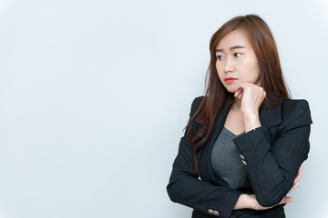 Beautiful asian business woman think something on white background,Thailand people,Stress from work,Sad woman concept