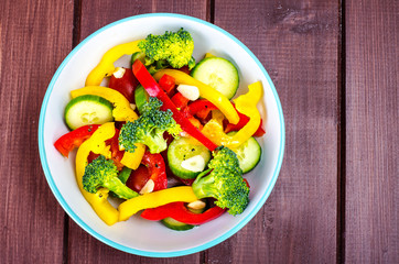 Concept of dairy. Salad of vegetables